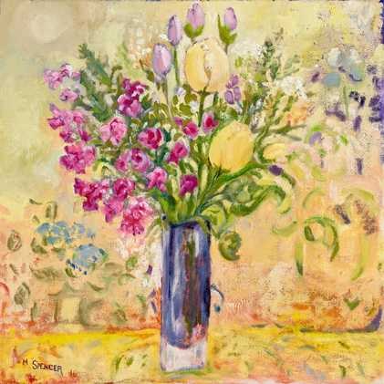 Tulips and flowers in a glass vase